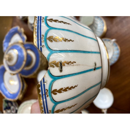 179 - A 19th century porcelain part tea service, approx. 36 pieces, turquoise, cobalt blue and gilt patter... 