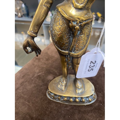 235 - A Tibetan brass figure of the goddess Tara, 30cm high