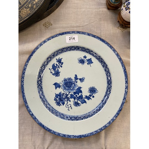 214 - A Chinese export blue and white porcelain charger decorated with chrysanthemums, 32cm diameter