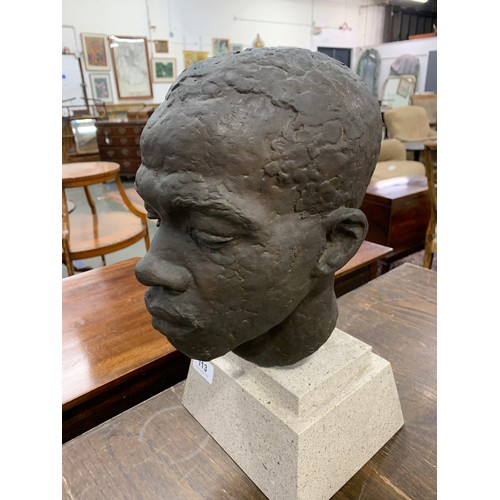 113 - Rhona Stern (South African, 1914-1998), portrait bust of a young man, on a granite plinth base, 37cm... 