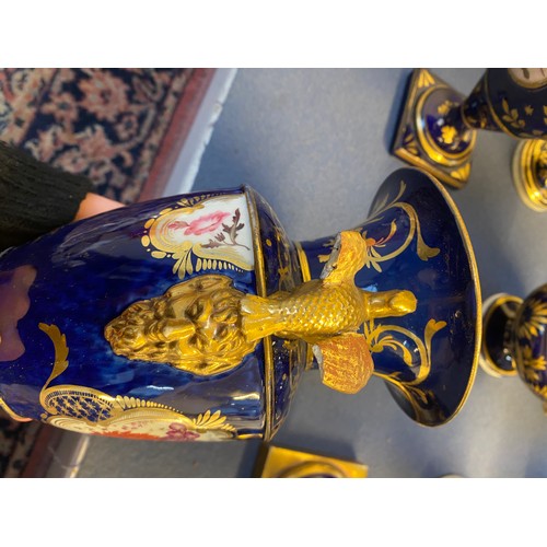 192 - A collection of eleven 19th century cobalt blue and gilt vases, various conditions, hand painted wit... 