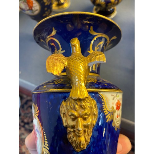 192 - A collection of eleven 19th century cobalt blue and gilt vases, various conditions, hand painted wit... 