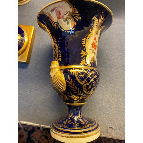 192 - A collection of eleven 19th century cobalt blue and gilt vases, various conditions, hand painted wit... 