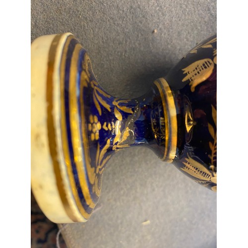 192 - A collection of eleven 19th century cobalt blue and gilt vases, various conditions, hand painted wit... 