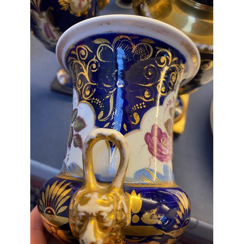 192 - A collection of eleven 19th century cobalt blue and gilt vases, various conditions, hand painted wit... 