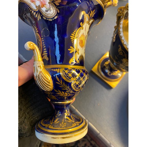 192 - A collection of eleven 19th century cobalt blue and gilt vases, various conditions, hand painted wit... 