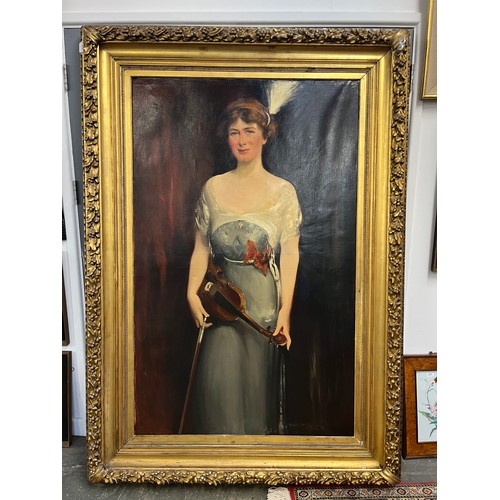 292 - A large early 20th century three quarter length portrait of a lady holding a violin, signed indistin... 