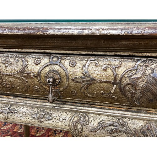 379 - An 18th century Italian gilt gesso console table, the top worked in low relief, over two slides and ... 