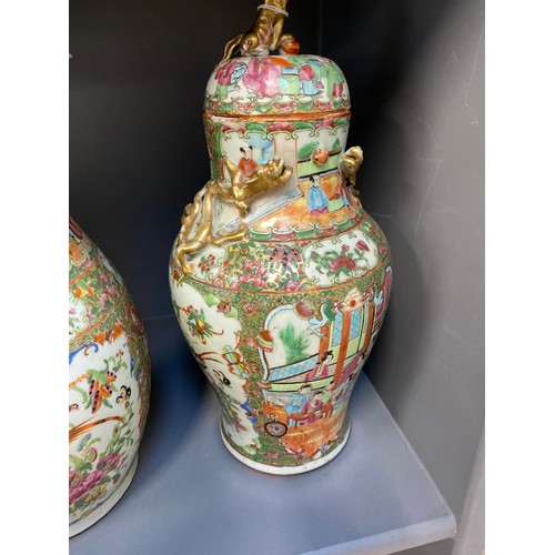 216 - Two Chinese famille rose porcelain vases, one with cover surmounted by foo dog, 36cm high and 41cm h... 