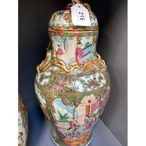 216 - Two Chinese famille rose porcelain vases, one with cover surmounted by foo dog, 36cm high and 41cm h... 