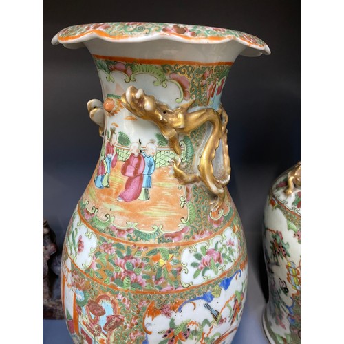 216 - Two Chinese famille rose porcelain vases, one with cover surmounted by foo dog, 36cm high and 41cm h... 