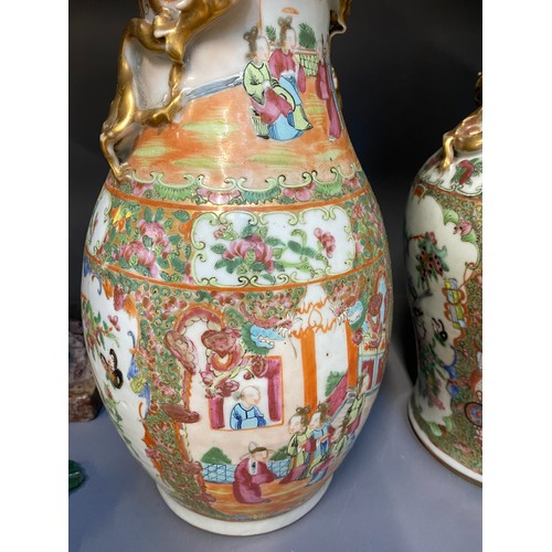 216 - Two Chinese famille rose porcelain vases, one with cover surmounted by foo dog, 36cm high and 41cm h... 