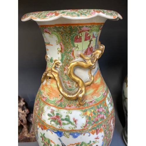 216 - Two Chinese famille rose porcelain vases, one with cover surmounted by foo dog, 36cm high and 41cm h... 