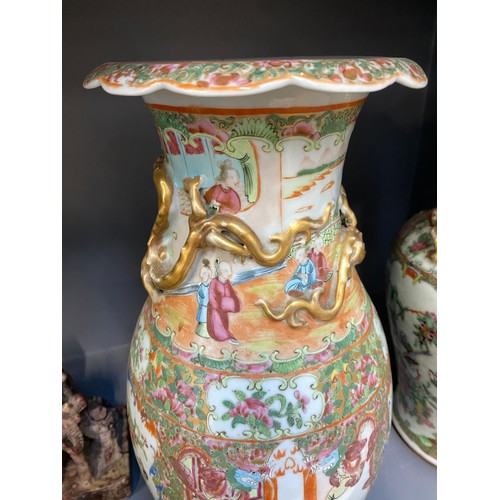 216 - Two Chinese famille rose porcelain vases, one with cover surmounted by foo dog, 36cm high and 41cm h... 