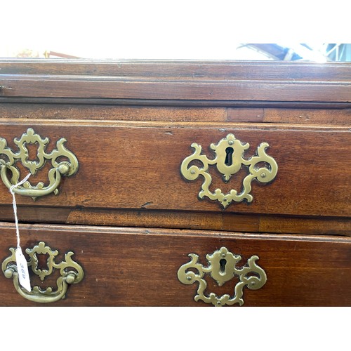 369 - A mid-18th century bachelor's chest, the caddy moulded top over a brushing slide and four graduating... 