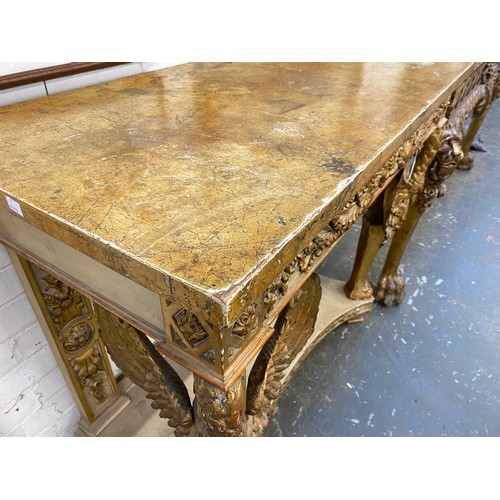 381 - A 19th century painted and gilt gesso Italian console table, the painted rectangular top over a carv... 