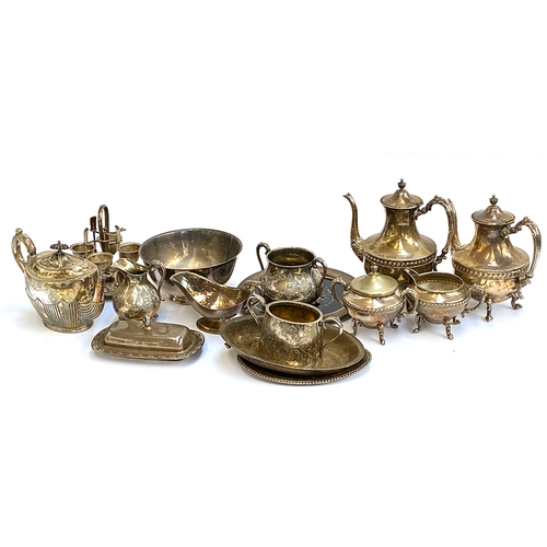 74 - A quantity of silver plated items to include a four piece teaset