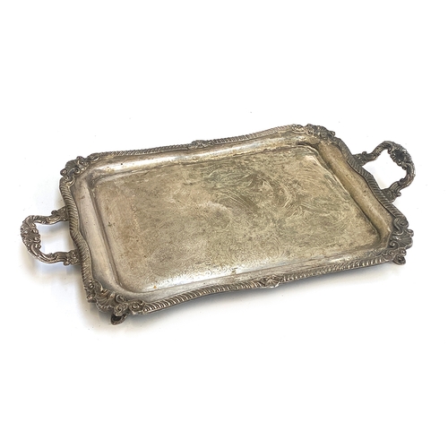 76 - Silver plated twin handled tray, the border chased with shells and scrolls, 68cmW, together with one... 