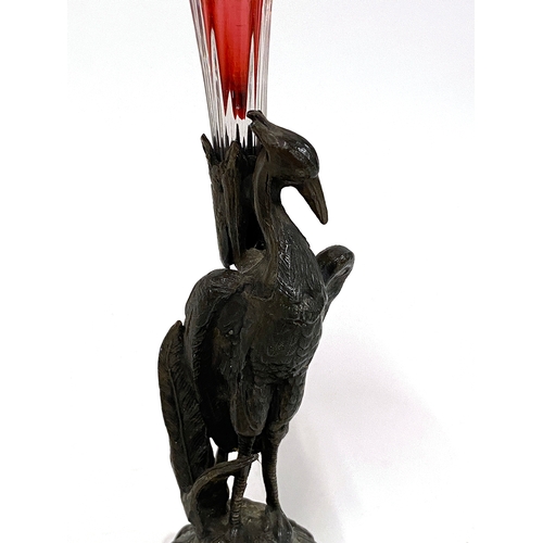 291 - Late 19th century spelter figural spill vase with a hand blown cranberry glass vase, diamond registr... 