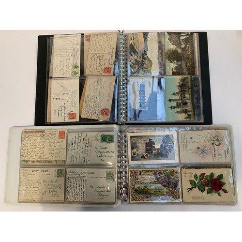 492 - POSTCARDS. Two albums. All vintage and inscribed/posted. Many 'greeting' examples and  some shipping... 