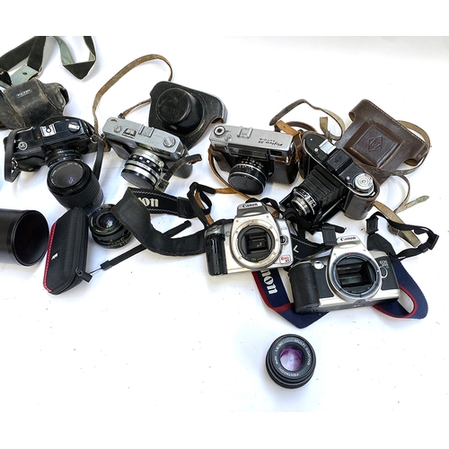 294 - Two boxes of photographic equipment, various 35mm cameras to include Fujica 35, Petri 7s, Petri Comp... 