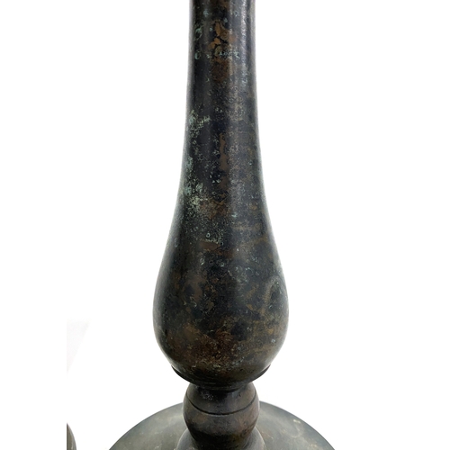 390 - Interior design interest: a pair of patinated bronze candlesticks, 33cmH