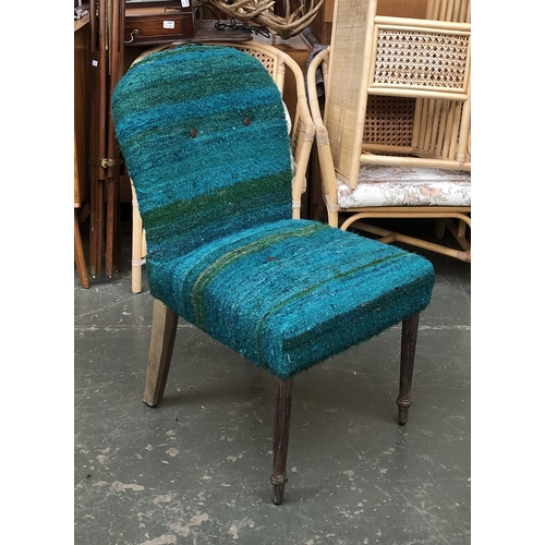 833 - A contemporary teal armchair with leather handle