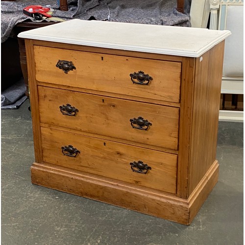 947 - A pine chest of three long drawers with white painted top, on plinth base, 91x50x83cmH