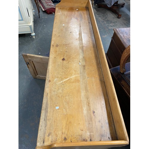 988 - A very large Victorian and later stripped pine sideboard or dresser base, three quarter gallery over... 