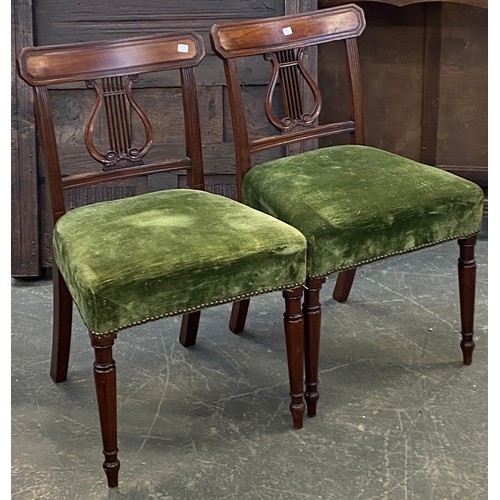 869 - A pair of Regency mahogany side chairs with lyre splats, stuffover seats and turned legs