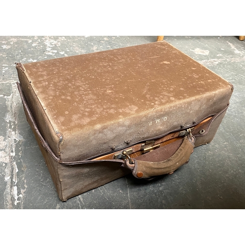 1002 - A gents pigskin overnight case with leather cover, opening in two halves to reveal to one with a fit... 