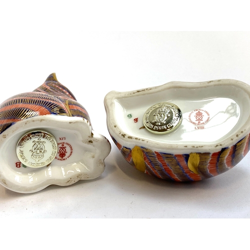 212 - Two Royal Crown Derby imari cat paperweights, marked LIX and LVII to base, 8.5cmH and 4.5cmH (2)