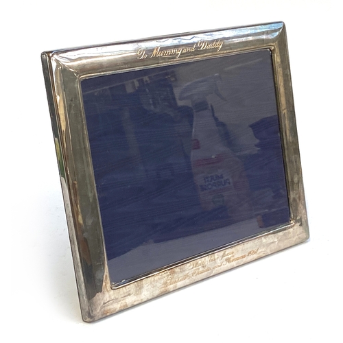 66 - A silver photo frame, internal dimensions 25.5x20cm internal dimensions