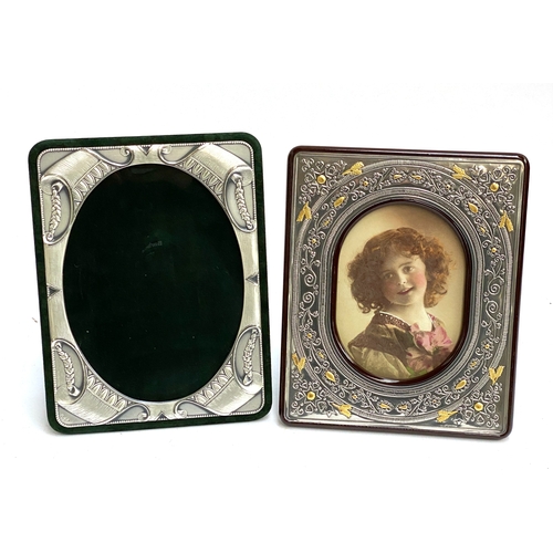 71 - Two silver picture frames, to include one with Arin, internal dimensions 23x17cm, 17x12cm