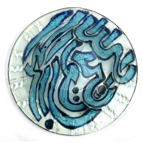 222 - A 20th century art glass dish decorated with Abaric script, signed Usama 1995, with glass stand