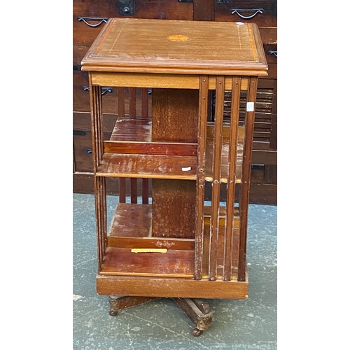 1009 - An Edwardian rotating bookshelf, with marquetry inlay, 46x46x87cmH