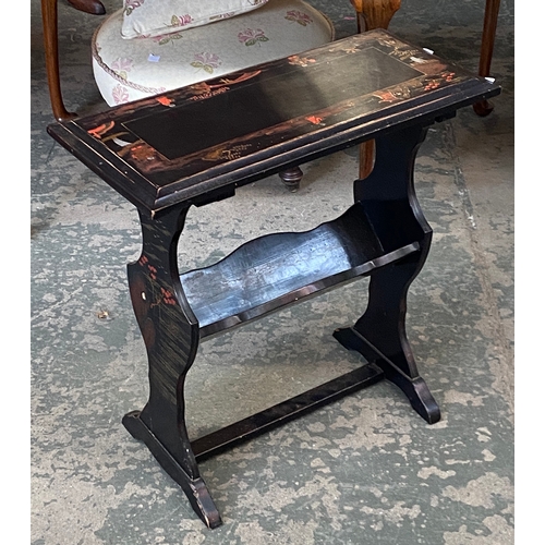 1121 - A black japanned occasional table with book trough below, 61x29x62cmH