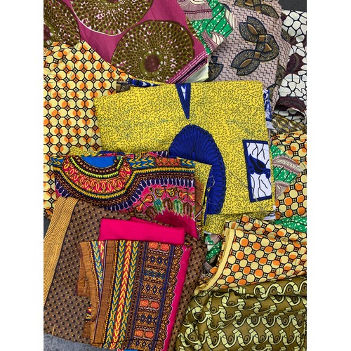 409 - A quantity of African wax print fabric squares