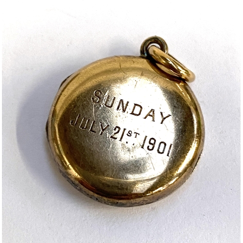 13 - An Edwardian yellow metal locket, engraved 'Margaret, Sunday July 21st 1901, 2cmD, 6.6g; together wi... 