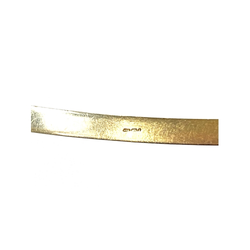 6 - A 9ct gold bangle, 6.6cm wide, 4.5g