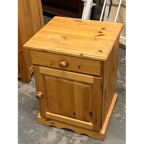 1104 - A pine bedside table; together with a nest of three occasional tables with leather inset tops