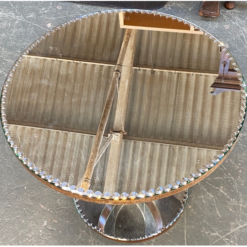 1134 - A circular mirrored occasional table, 59x51cm