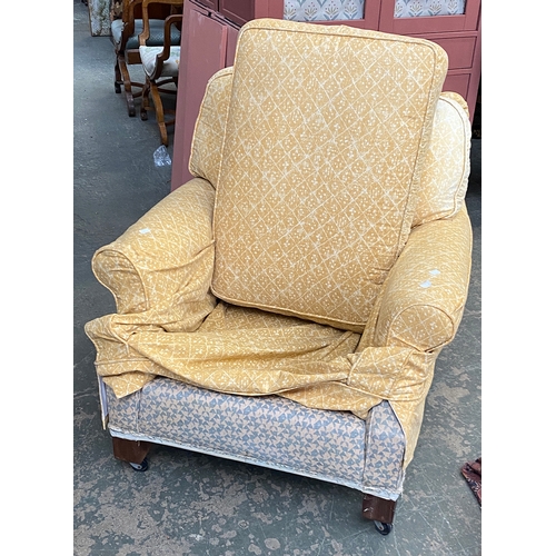 837 - A 20th century country house armchair, with pale yellow loose cover, 80cmW