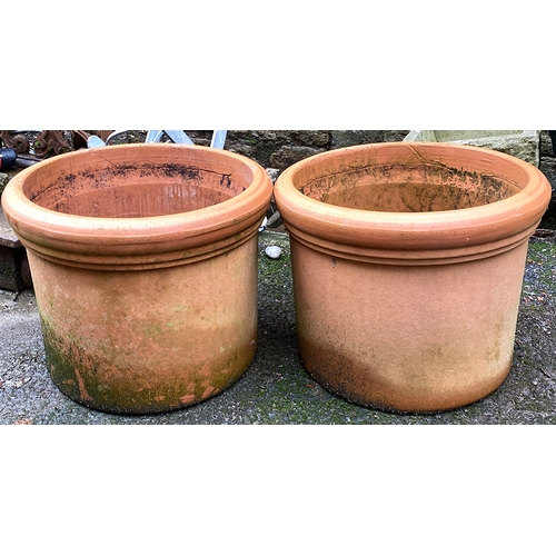 821 - A pair of large cylindrical terracotta planters, 48x38cm