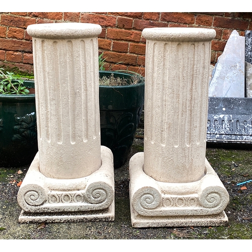 822 - A pair of composite ionic columns, 74cmH