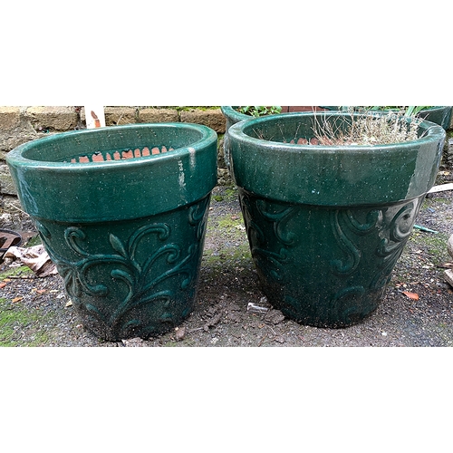 823 - A pair of green glazed large terracotta planters, 47x46cmH