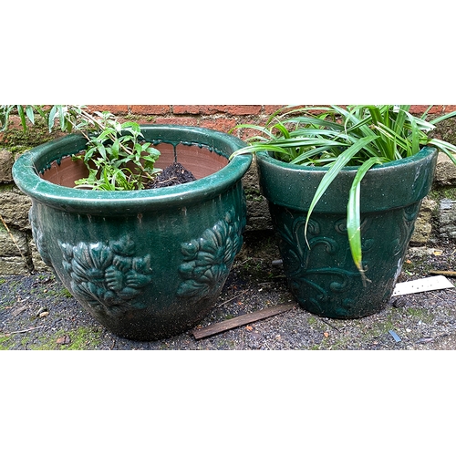 824 - Two green glazed terracotta planters, 48x39cmH and 38x38cmH