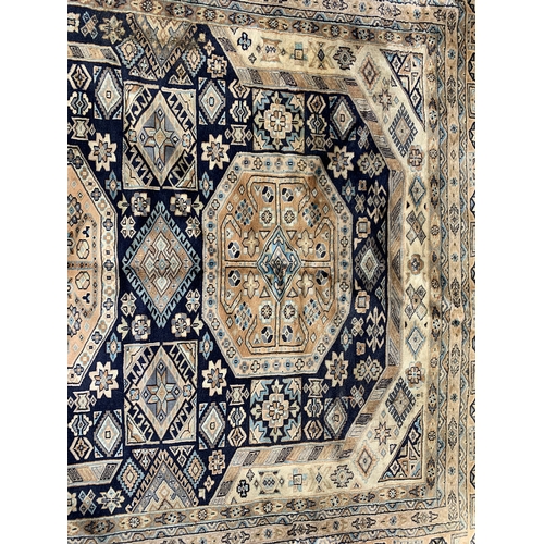 797 - A pale ground rug with three central medallions (af), 214x309cm