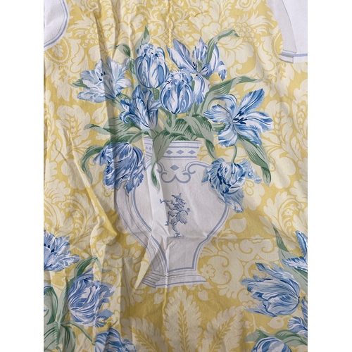 861 - Two pairs of heavy lined and interlined curtains, yellow ground with blue tulips in vases pattern, a... 