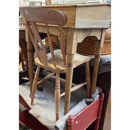 1078 - A pine school desk with hinged slope, 60cmW; together with a beech and elm kitchen chair